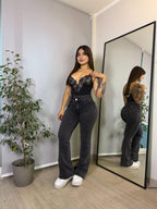 Jeans Flare Asimétrico Milán Negro · Emporium